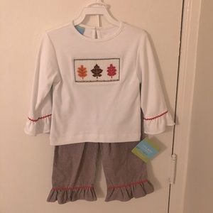 NWT hand smocked leave long sleeved top and pants.
